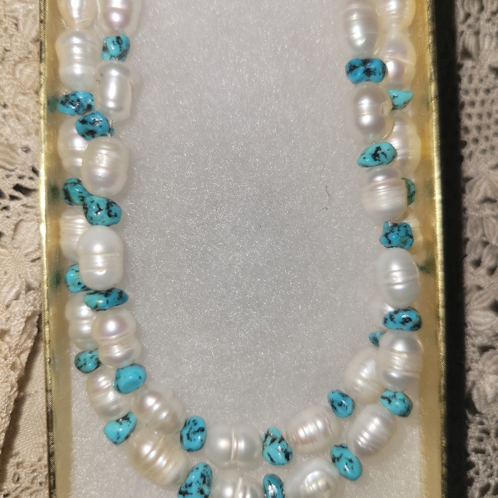 Single strand pearl like and turquoise like 24 inch necklace